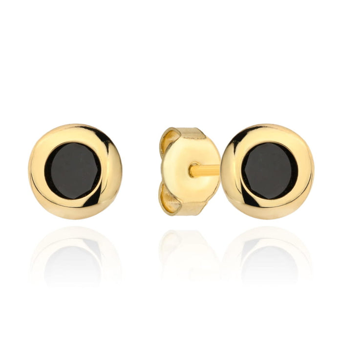 Cercei stud din aur cu piatră neagră într-un cadru neted