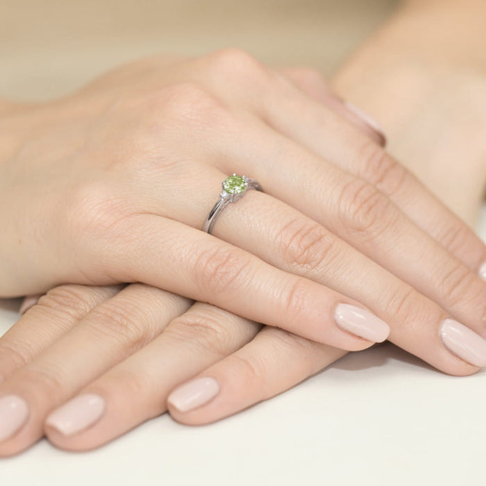 Inel Aur 14K cu Peridot 0.60 ct si Diamante 0.03 ct - Alb