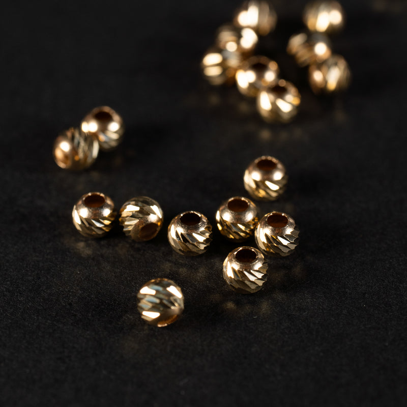 Biluta aur 14K Slash 4 mm orificiu 1.8 mm - 1 buc