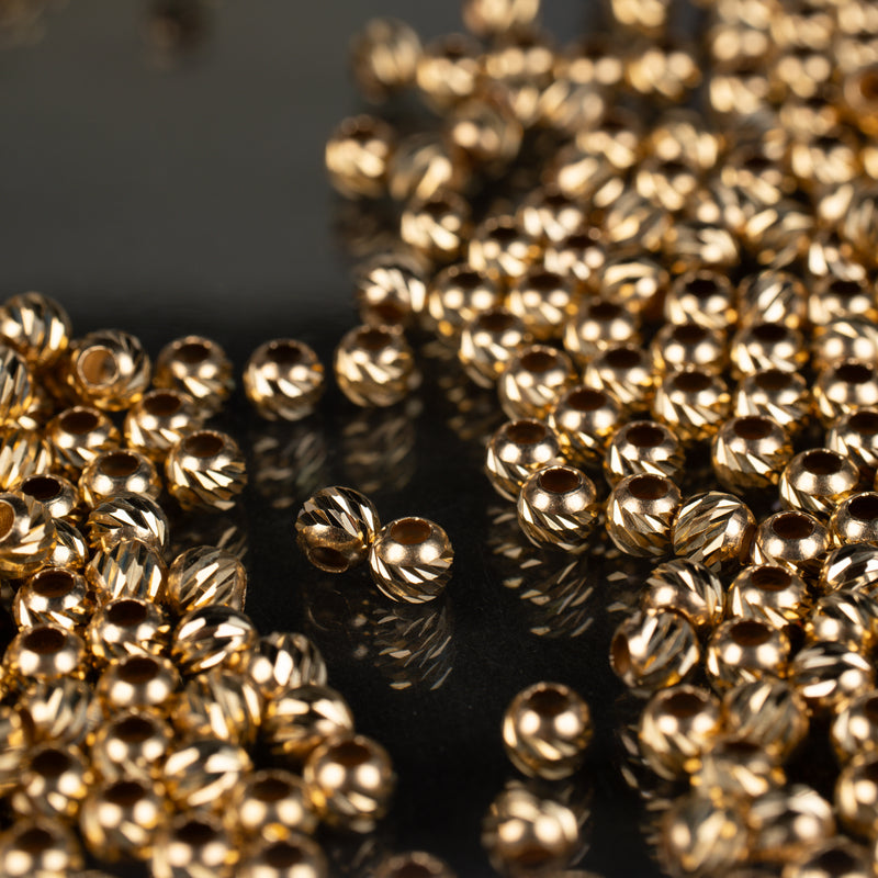 Biluta aur 14K Slash 4 mm orificiu 1.8 mm - 1 buc
